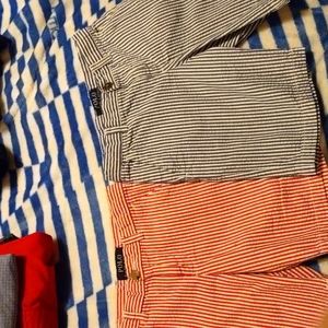 Two pairs of polo striped shorts the red are in good cond,the blue have a tiny